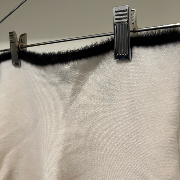 White/creamish with black detailing skirt that flares out and has a fur line - Picture 2 of 2